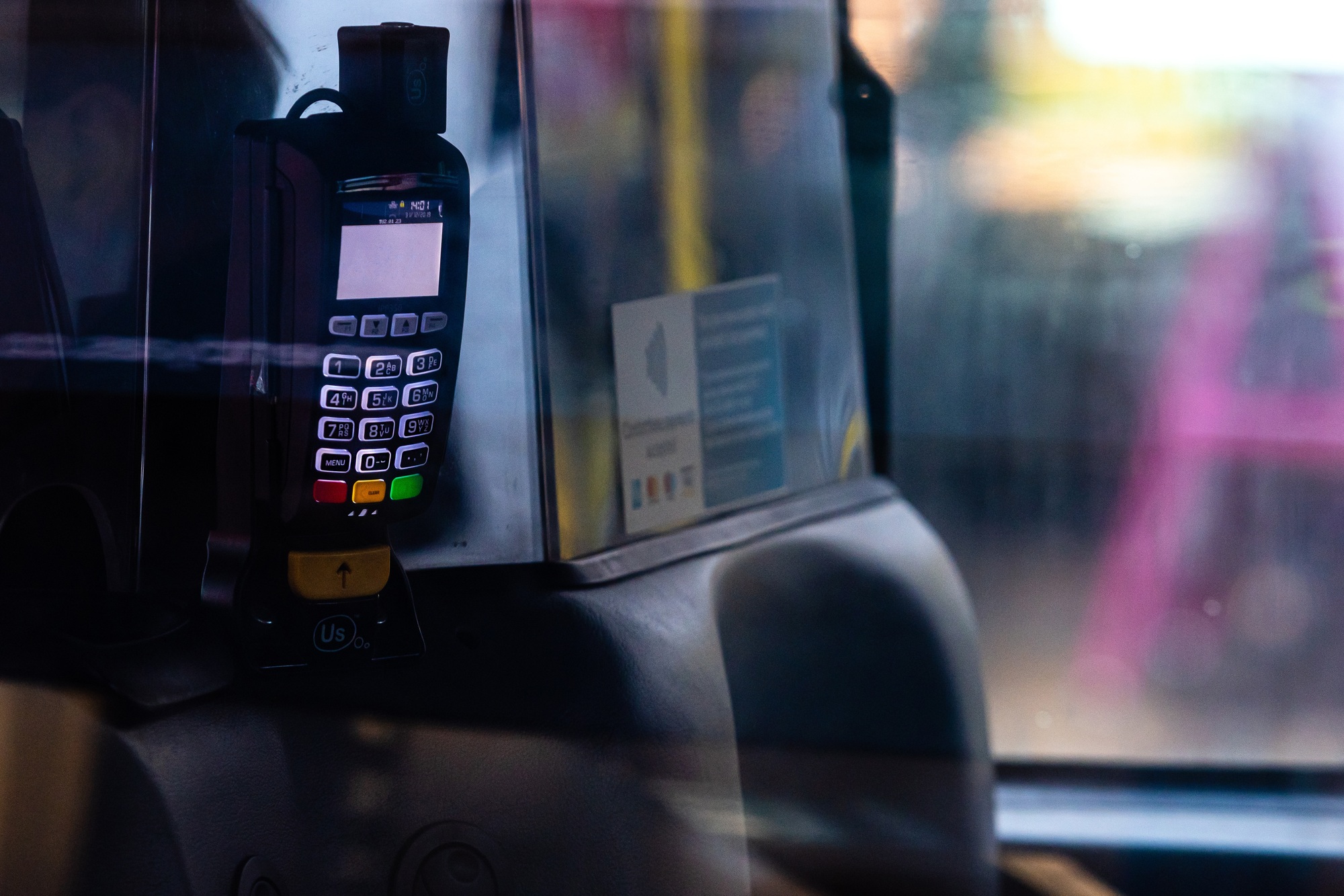 An abstract view through a taxi window to a bank terminal for payment for a London taxi ride